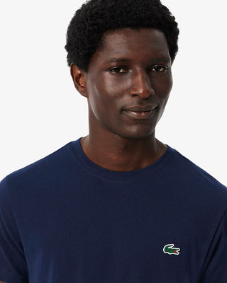 T-shirt LACOSTE sportiva grafica Ultra Dry con coccodrillo