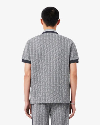 Polo LACOSTE in Jacquard con monogramma dal taglio classico - Moda & Modi Luxury
