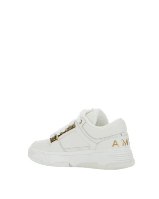 Sneaker AMIRI Metallic - Moda & Modi Luxury