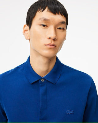 Polo LACOSTE Uomo regular fit in piquè elasticizzato - Moda & Modi Luxury