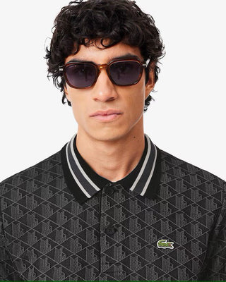 Polo LACOSTE dal taglio classico in jacquard con monogramma - Moda & Modi Luxury